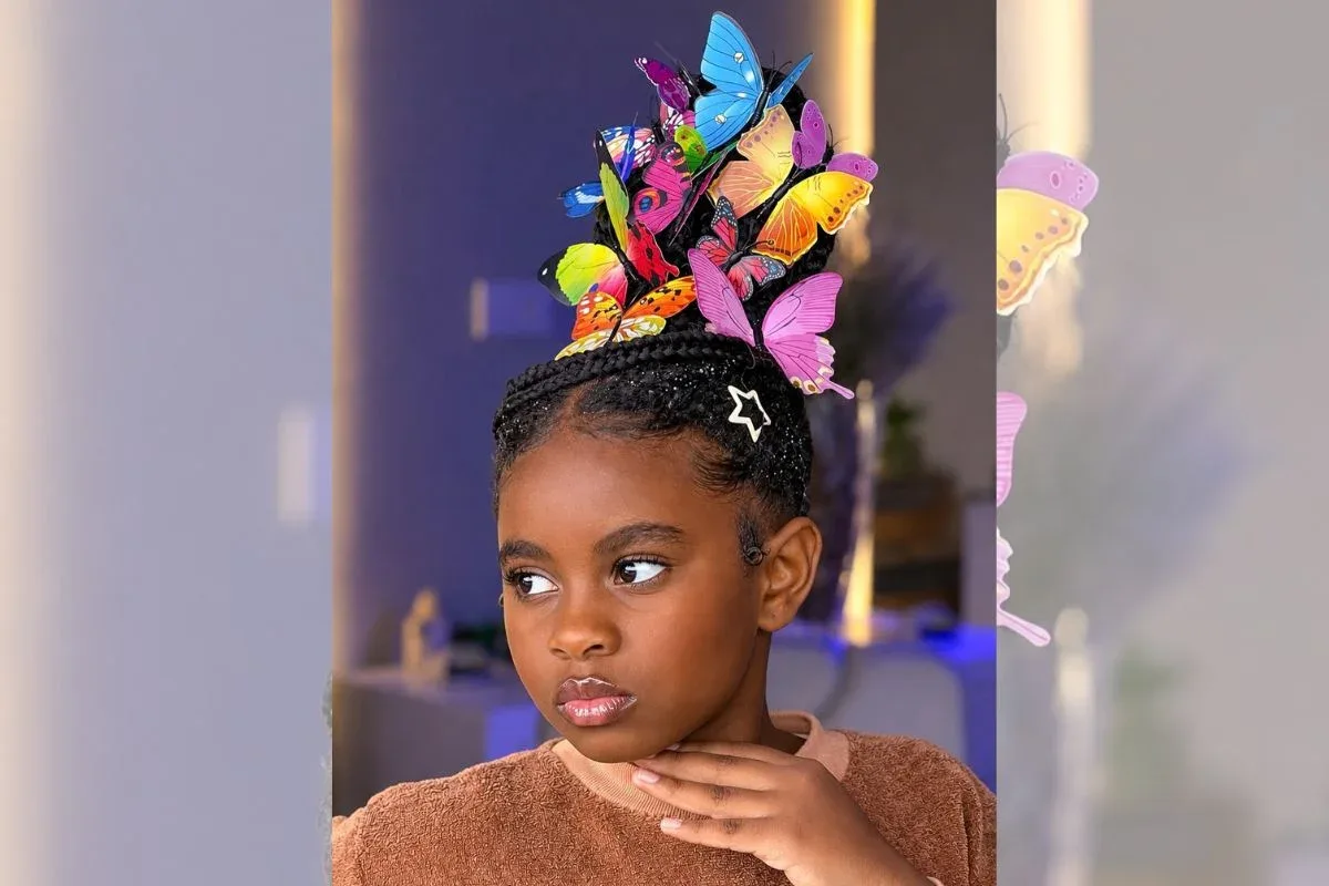 Mãe capricha e faz surpreendente penteado com borboletas na filha
